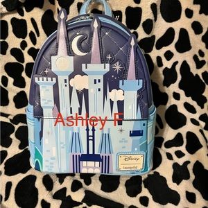 Cinderella castle glow in the dark loungefly backpack